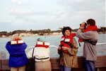 Joyce King, Grace Stock, and Ken Spilios on Boat Deck in Apalachicola, Florida by Pamela J. Bowen