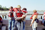 Ken Spilios, Don Ware, and Gail Parson on Boat Deck by Pamela J. Bowen
