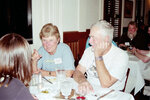Lyn Atherton and Brooks Atherton Pose While Seated by Pamela J. Bowen