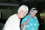 Sally Jue Smiles Beside Marie Slaney in Apalachicola, Florida by Pamela J. Bowen