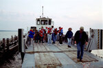 Group Departing Deck of Boat, A by Pamela J. Bowen