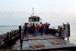 Group Departing Deck of Boat, B by Pamela J. Bowen