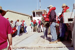 Group Departing Deck of Boat, C by Pamela J. Bowen