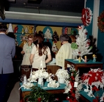 Christmas shoppers at a counter