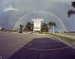 Rainbow over University Mall sign by Skip Gandy