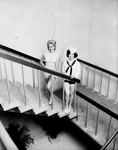 Two contestants posing on stairwell by Skip Gandy