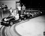 Cars on a track at the Super Test Amusement Park