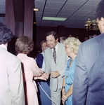 Rosalyn Carter shaking hands with supporters by Skip Gandy