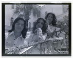 The three-sibling band The Fremis poses on a Mediterranean patios, D