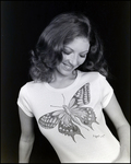 A woman models a Hickok original butterfly shirt in Tampa, Florida, B