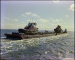 A dredging barge belonging to Baycon Industries, Incorporated in Tampa, Florida, A