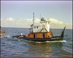 A dredging barge belonging to Baycon Industries, Incorporated in Tampa, Florida, E