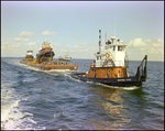 A dredging barge belonging to Baycon Industries, Incorporated in Tampa, Florida, F