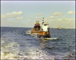 A dredging barge belonging to Baycon Industries, Incorporated in Tampa, Florida, H
