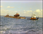 A dredging barge belonging to Baycon Industries, Incorporated in Tampa, Florida, I