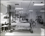 Nurses tend to patients inside Bay Pines Veterans Affairs (V.A.) Hospital in St. Petersburg, Florida by Skip Gandy