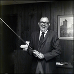 A portrait of Ed Bolding holding a golf club in Tampa, Florida in, A