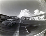 A car drives past Bay Pointe Condominiums in Tampa, Florida, A