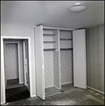An empty bedroom with a built-in closet at Bayshore Towers Condominiums in Tampa, Florida in, B