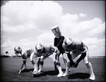 Tampa Bay Buccaneers Football Practice with Man with Bag over Head, A by Skip Gandy