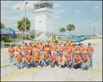 Group Photo at the Lakeland Air Center, A by Skip Gandy