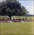 Children Playing Box Hockey at Brandon Sports and Aquatic Center, Brandon, Florida, C by Skip Gandy