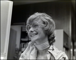 Woman With Large Round Glasses Smiling by Skip Gandy