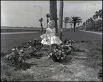 Young Girl Picking Bougainvillea Flowers, C by Skip Gandy