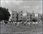 Students Stretching in Field, Berkeley Preparatory School, Tampa, Florida, A by Skip Gandy