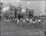 Students Stretching in Field, Berkeley Preparatory School, Tampa, Florida, B by Skip Gandy