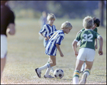 Children Playing Soccer on a Field, Tampa, Florida, C by Skip Gandy