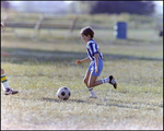 Children Playing Soccer on a Field, Tampa, Florida, E by Skip Gandy