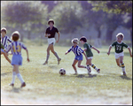 Children Playing Soccer on a Field, Tampa, Florida, O by Skip Gandy