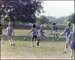 Children Playing Soccer on a Field, Tampa, Florida, W by Skip Gandy