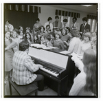 Students Singing Around a Piano, Berkeley Preparatory School, Tampa, Florida, C by Skip Gandy