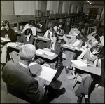 Faculty Member Conducting a Lesson to a Classroom, Berkeley Preparatory School, Tampa, Florida by Skip Gandy