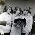 Students Looking at a Copy of Musical, Berkeley Preparatory School, Tampa, Florida by Skip Gandy