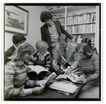 Students and Faculty Looking Through Yearbooks, Berkeley Preparatory School, Tampa, Florida, C by Skip Gandy