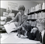 Faculty Member Helping Students in Library, Berkeley Preparatory School, Tampa, Florida, A by Skip Gandy