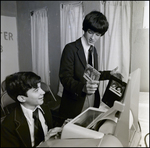 Two Students Discuss a Pair of Cassette Tapes, Berkeley Preparatory School, Tampa, Florida by Skip Gandy