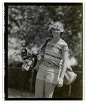 A Student Smiles Holding a Set of Golf Clubs, Berkeley Preparatory School, Tampa, Florida, D by Skip Gandy