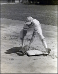 A Baseman Scoops the Ball From the Ground, Berkeley Preparatory School, Tampa, Florida, B