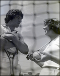 Two Tennis Players Giggle Behind the Net, Berkeley Preparatory School, Tampa, Florida, D by Skip Gandy