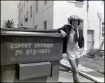 A Student Poses by the Dumpster in His Suit Jacket and Underwear, Berkeley Preparatory School, Tampa, Florida, B by Skip Gandy