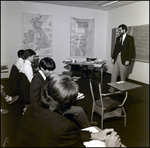 An Instructor Speaks With a Student at Berkeley Preparatory School in Tampa, Florida by Skip Gandy