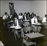 Rows of Students Laugh While Reading in Class at Berkeley Preparatory School in Tampa, Florida by Skip Gandy