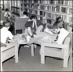 Students Study While Lounging in Armchairs at the Library at Berkeley Preparatory School in Tampa, Florida by Skip Gandy