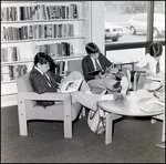 Students Prop up Their Feet While Reading in the Library at Berkeley Preparatory School in Tampa, Florida by Skip Gandy