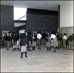 Students Chat and Visit Their Lockers at Berkeley Preparatory School in Tampa, Florida by Skip Gandy