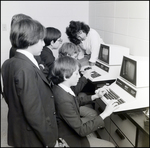 Two Students Type at Computers at Berkeley Preparatory School in Tampa, Florida, A by Skip Gandy